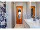Clean bathroom featuring a double vanity, updated fixtures, and ample lighting at 1410 Beverly Ave, Shelby, NC 28152