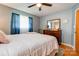 Bright bedroom featuring a comfortable bed, dresser, and a well-lit mirror at 1410 Beverly Ave, Shelby, NC 28152