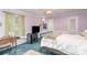 Bedroom featuring vintage decor and pastel pink walls at 1620 Edgefield Ave, Gastonia, NC 28052