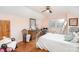 Cozy bedroom with hardwood floors, a comfortable bed, and natural light from the window, creating a serene retreat at 1620 Edgefield Ave, Gastonia, NC 28052