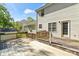 Large back deck features a door to the house, railings, and newly replaced wood at 1694 Trotters Ridge Rd, Stanfield, NC 28163