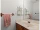 Bathroom featuring tub, sink with mirror, and towel rack at 1694 Trotters Ridge Rd, Stanfield, NC 28163