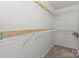 Walk-in closet with wire shelving units installed on the walls at 1694 Trotters Ridge Rd, Stanfield, NC 28163