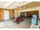 Spacious garage with tools and lawn equipment at 1694 Trotters Ridge Rd, Stanfield, NC 28163