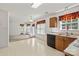 Bright kitchen and dining area with lots of windows and a view to the living room at 1694 Trotters Ridge Rd, Stanfield, NC 28163