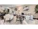 Stylish living room with modern furniture, neutral tones, hardwood floors, and an open floor plan at 1702 Herrin Ave, Charlotte, NC 28205