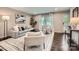 Bright and cozy living room featuring modern decor, comfortable seating, and ample natural light at 1702 Herrin Ave, Charlotte, NC 28205