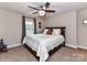 Bedroom with a ceiling fan and a window with blinds letting in natural light at 1805 Axholme Ct, Waxhaw, NC 28173