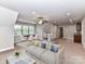 Spacious living room with a cozy sitting area and plenty of space for a dining and game table at 1805 Axholme Ct, Waxhaw, NC 28173