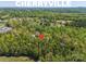 A nice view of Cherryville surrounded by lush, mature trees at 208 Spinners Dr, Cherryville, NC 28021