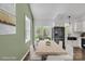 Bright dining room featuring a modern table set, sliding glass doors, and sleek finishes, perfect for entertaining at 208 Spinners Dr, Cherryville, NC 28021