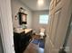 Cozy bathroom with a single sink vanity and a toilet at 2116 Dana Pl, Shelby, NC 28152