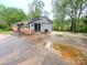Exterior view of home addition featuring sliding glass door to the backyard at 2116 Dana Pl, Shelby, NC 28152
