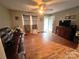 Inviting living room with hardwood floors, a ceiling fan, and natural light at 2116 Dana Pl, Shelby, NC 28152