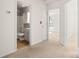 Well-lit bathroom with a vanity and shower-tub combination at 2120 Turtle Point Rd, Charlotte, NC 28262