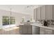 Bright kitchen featuring stainless steel appliances, gray cabinets, and a sliding glass door to the outdoor deck at 2120 Turtle Point Rd, Charlotte, NC 28262