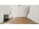 Bright living room with a fireplace and staircase at 2120 Turtle Point Rd, Charlotte, NC 28262