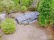 Birds-eye view of single Gathering home surrounded by green trees in wooded neighborhood at 2144 Newhart Rd, Charlotte, NC 28214
