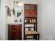 Bathroom featuring a vanity sink, a medicine cabinet, and a towel rack at 2144 Newhart Rd, Charlotte, NC 28214
