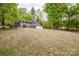 Exterior view of grey home and front yard at 2144 Newhart Rd, Charlotte, NC 28214