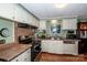 Functional kitchen with updated appliances and plenty of counter space for cooking at 2144 Newhart Rd, Charlotte, NC 28214