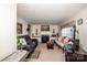 Cozy living room features fireplace, large TV, and ample seating perfect for entertaining at 2144 Newhart Rd, Charlotte, NC 28214