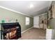 Nice living room featuring a desk, natural light, and pleasing green paint at 2144 Newhart Rd, Charlotte, NC 28214