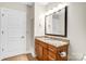 Bathroom boasts granite counters, modern fixtures, and ample cabinet space at 222 S Caldwell St # 1510, Charlotte, NC 28202
