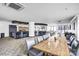 Open common area with modern furnishings, a dining table, and a bar area at 222 S Caldwell St # 1510, Charlotte, NC 28202