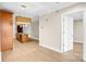 Open kitchen with granite island is visible in the living space, featuring modern cabinetry and fixtures at 222 S Caldwell St # 1510, Charlotte, NC 28202