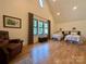 Spacious bedroom featuring vaulted ceiling, natural light, and hardwood floors at 2309 Pinckney Ave, Charlotte, NC 28205