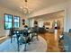 Charming dining room with an open view to the living area, featuring a round table and elegant decor at 2309 Pinckney Ave, Charlotte, NC 28205