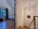 Welcoming hallway with staircase leading to a beautifully decorated bedroom at 2309 Pinckney Ave, Charlotte, NC 28205