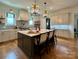 Well-appointed kitchen features a large island, modern appliances, and ample counter space at 2309 Pinckney Ave, Charlotte, NC 28205