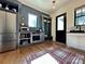 Functional mud room features built-in storage, stainless steel appliances, and convenient access to the entry at 2309 Pinckney Ave, Charlotte, NC 28205