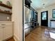 Well-organized mud room boasts stainless steel appliances, custom cabinetry, and a convenient entry at 2309 Pinckney Ave, Charlotte, NC 28205