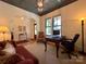 Bright and open home office featuring hardwood floors, and plenty of natural light at 2309 Pinckney Ave, Charlotte, NC 28205