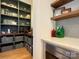 Organized walk-in pantry with custom shelving and ample storage space for all your needs at 2309 Pinckney Ave, Charlotte, NC 28205