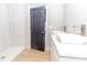 Bathroom featuring a walk-in shower with marble walls and dual vessel sinks at 2350 14Th Street Ne Ct, Hickory, NC 28601