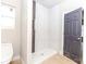 Bathroom features a walk-in shower with marble walls and a neutral color scheme at 2350 14Th Street Ne Ct, Hickory, NC 28601
