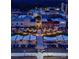 Night aerial view of downtown with string lights, landscaping, outdoor seating, and shops in a vibrant area at 2350 14Th Street Ne Ct, Hickory, NC 28601