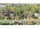 Beautiful aerial view of a neighborhood, showcasing lush landscaping and mature trees by the waterfront at 255 Fernbrook Dr, Mooresville, NC 28117