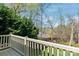 Scenic backyard view from deck overlooking the lake and mature trees at 255 Fernbrook Dr, Mooresville, NC 28117