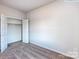 Bedroom with neutral carpet, a closet, and white trim at 2579 Ruby Dixon Crossing Dr # 12, Gastonia, NC 28056
