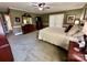 Spacious bedroom featuring neutral carpet, wood furnishings and a ceiling fan at 271 Ikerd Se Dr, Concord, NC 28025