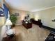 Cozy home office with a large wooden desk, ample lighting, and neutral colors perfect for working from home at 271 Ikerd Se Dr, Concord, NC 28025