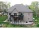 Backyard features a spacious deck and patio, perfect for outdoor entertaining and relaxation in a private setting at 2757 Trent Ne Dr, Conover, NC 28613