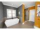 Modern bathroom with a freestanding tub, glass-enclosed shower, and contemporary design at 2757 Trent Ne Dr, Conover, NC 28613