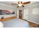 Bedroom with hardwood floors, overhead fan, and ample natural light at 2757 Trent Ne Dr, Conover, NC 28613