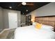 Comfortable bedroom with neutral tones, a ceiling fan, and an ensuite bathroom entrance at 2757 Trent Ne Dr, Conover, NC 28613
